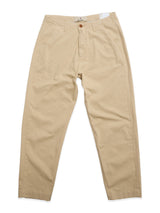 The BGpalco Rodas Pants by Blue de Gênes are relaxed fit chinos in pale khaki, featuring side pockets and a button closure, shown laid flat on a white background.