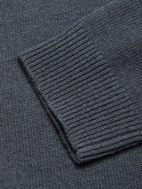 Close-up of the Nuvali Polo Cardigan - Dark Slate by Blue de Gênes, highlighting the ribbed cuff and textured wool blend knit—ideal for men's layering.