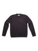 A dark navy Toyama Knit L/S crewneck sweater by Blue de Gênes, featuring four buttons on the left shoulder, knitted in Denmark and laid flat on a white background.