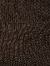 Close-up of the Boshi Beanie - Brown by Blue de Gênes, highlighting detailed ribbed and smooth stitching patterns with visible yarn texture—expertly crafted from Merino wool and knitted in Denmark.