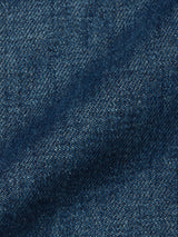 Close-up of the Yuma Fano Jacket - Denim Blue by Blue de Gênes, highlighting its detailed weave, diagonal lines, and natural shading—ideal for a workwear-inspired look.