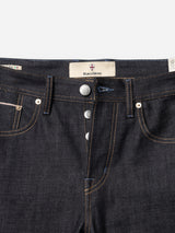 Close-up of the BGgiacomo Selvedge V2 Jeans in raw dark blue denim, featuring a button fly, visible stitching, and a Blue de Gênes label above the waistband. Expertly crafted in Italy, these relaxed fit jeans showcase timeless style and superior craftsmanship from Blue de Gênes.