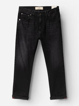 The BGmarco Connor Jeans - Black Denim Used by Blue de Gênes are laid flat on a white background, crafted from 100% cotton denim with a classic five-pocket design, relaxed fit, and rolled-up cuffs.