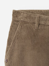 Close-up of the BGpalco Cord Chino in Sepia Tint Brown by Blue de Gênes, highlighting the relaxed fit waistband, belt loop, front pocket, and a small stitched logo near the seam.