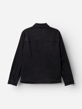 The BGbarnaba Iro Overshirt by Blue de Gênes is shown from the back in navy on a plain white background. Made from a soft lyocell-cotton blend, this workwear-inspired jacket features long sleeves, a collar, visible seam details, and buttoned cuffs, with no visible logos or embellishments.