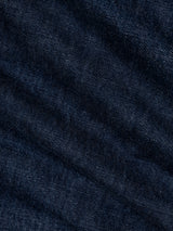 Close-up of BGgiacomo Arthour Jeans - Denim Blue by Blue de Gênes, featuring dark blue denim fabric with a distinctive diagonal weave texture and subtle fading, emphasizing the timeless and rugged look of these durable jeans.