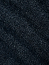 Close-up view of the comfort stretch denim fabric in a dark blue wash from the BGvinci Ewan Jeans - Color Denim by Blue de Gênes, highlighting its woven texture and subtle color variations—ideal for regular fit jeans.
