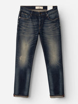 The BGvinci Finlay Jeans - Vintage Wash by Blue de Gênes are a pair of dark blue jeans featuring a vintage wash with a faded, worn appearance, visible creasing on the front thighs, classic five-pocket styling, and rolled-up cuffs. Crafted from comfort stretch denim, they are displayed against a white background.