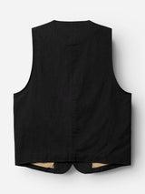 Back view of the BGduncan Ian Gilet in black by Blue de Gênes, featuring a slightly curved hem and tan lining peeking out at the bottom. Crafted from lightweight, textured fabric, this versatile waistcoat pairs perfectly with a three-piece suit. Displayed against a plain white background.