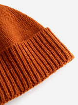 Close-up of the BGboshi Beanie in Ginger Bread Orange by Blue de Gênes, featuring a ribbed turn-up edge, displayed on a white background—a signature style from the brand.