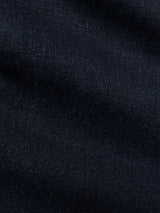 Close-up of BGvinci Black OD Jeans in blue black denim from Blue de Gênes, showcasing the comfort stretch fabric's texture, weave details, and subtle variations in color and shading.