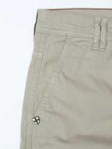 Close-up of the upper part of the Blue de Gênes BGpaulo Teo Pant in shadow green, featuring a side pocket with detailed stitching and a small diamond-shaped logo near the seam, evoking classic vintage military pant styling.