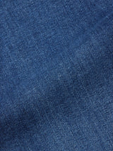 Close-up of the Recco Blue Vintage Jeans - Vintage Wash by Blue de Gênes, highlighting the diagonal seam and textured weave characteristic of relaxed fit denim.