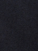 Close-up of the Shiba Melton Coat by Blue de Gênes in Dark Navy, showcasing its rich, textured Melton wool surface with a soft and slightly fuzzy appearance.