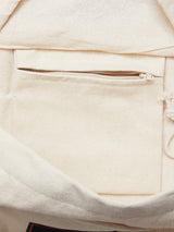 Close-up of the BDG Canvas Bag - Off White by Blue de Gênes, highlighting the interior fabric pocket with a closed zipper and visible stitching details.