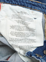The image shows the inside of BGrepi Kanto Jeans - Used by Blue de Gênes, featuring a white pocket lining with black text about architect Rene Piro, visible stitching, and metal rivets.