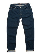 The Vinci Topaz Jeans - Rinse Wash by Blue de Gênes are dark blue regular fit jeans with rolled-up cuffs, five pockets, and a button fly, made from comfort stretch denim and displayed flat on a white background.