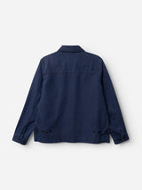 The BGcuddy Nebraska Jacket - Blue by Blue de Gênes is displayed flat, showcasing its back on a plain white background. This navy blue utility jacket features long sleeves with buttoned cuffs, a classic collar, and is crafted from high-density dobby weave cotton for enhanced durability.