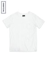 The Sagi Nuovo T-shirt by Blue de Gênes is a men's regular fit plain white tee with a small chest pocket, made from premium cotton. Shown on a white background, it features a vertical label reading THE CLASSICS—a true wardrobe staple.