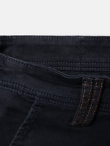 Close-up of the waistband and belt loop of enzyme washed BGpaulo Pavia V3 Chino - Midnight Blue in dark blue with contrast orange stitching.