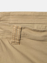 Close-up of the waistband and belt loop of Blue de Gênes BGpaulo Pavia V3 Chino - Khaki enzyme-washed pants, featuring double-stitched seams in cotton stretch fabric.