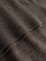 Close-up of the BGigor Polo Knit in Sepia Tint Brown by Blue de Gênes, highlighting the ribbed knit fabric’s visible texture, fine stitching, and soft merino wool material.