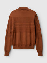 Blue de Gênes BGstu Rollneck Knit in Ginger Bread Orange, a rusty orange sweater with a textured knit pattern across the chest, sleeves, and hem.