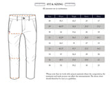 The illustration of Palto Riga Chino - Blue Stripe by Blue de Gênes shows cotton fabric pants with a button fly alongside a chart with waist, thigh, knee, and hem measurements in cm for sizes 28 to 38. A note mentions variations in natural materials.