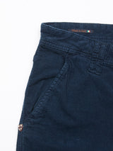 Close-up of Blue de Gênes Paulo Tucan Chino in Navy, featuring a visible side pocket, belt loops, and an Italian flag tag reading Made in Italy. The textured fabric provides a comfort stretch for an optimal fit.