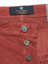 Close-up of Paulo Tucan Chino - Chipotle pants by Blue de Gênes, showcasing three metallic buttons and a ridged corduroy texture that reflects its refined Italian design.