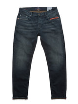 Vinci Haworth Jeans by Blue de Gênes in denim blue, crafted from comfort stretch denim with a slight faded effect. They feature a button and zipper closure, standard pockets with a coin pocket, and visible label and inner lining at the waistband.