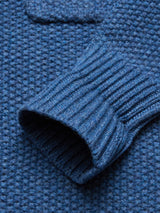 Close-up of the Aimone Knit Cardigan in Sugar Blue by Blue de GĂȘnes, featuring a textured waffle pattern and ribbed cuff on soft, cozy material.