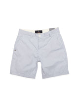 The Elak Riga Shorts - Blue Stripe by Blue de Gênes are light blue mens shorts crafted from fine line cotton, featuring a relaxed regular fit, side pockets, Corozo nut button closure, a small embroidered logo near the pocket, and a neatly folded hem.