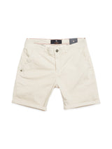 The Menzino Shorts - Stone by Blue de Gênes are made from garment-dyed cotton with front pockets, a button closure, and belt loops. They feature an embroidered emblem on the left pocket, a label on the waistband, and a straight hem above the knee.