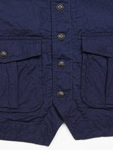 Close-up of the Blue de Gênes Ludovico Tarlo Gilet in navy chambray with a crumpled texture, featuring black buttons, two flap front pockets, and detailed stitching. The lightweight fabrics slightly worn look adds character to this stylish piece.