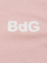 The Salty Logo T-Shirt in Porcelain Pink from Blue de Gênes is crafted from cotton-jersey fabric, featuring white embroidered BdG lettering that creates a stylish crewneck tee.