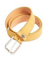 The Suede Belt - Yellow Grain by Blue de Gênes is a yellow coiled belt in Italian leather featuring a silver buckle and brown stitching. A small brown logo is embossed near the buckle. Made in Italy with a smooth finish, its perfect for casual wear.