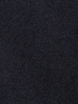 Close-up view of the Blue de Gênes Shiba Melton Coat in Dark Navy, showing its dark, textured Melton wool surface with a soft, slightly fuzzy finish.