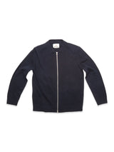 The Nuvali Polo Cardigan – Navy by Blue de Gênes is a men's wool blend sweater featuring a pointed collar, long sleeves, and a front silver zipper—ideal for versatile layering.