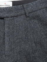Close-up of Kyoto Pant - Black Pattern by Blue de Gênes. The waistband displays the brand label, emphasizing the trousers’ relaxed straight-leg design and subtle gray and black pattern.