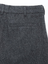 Close-up of the back pocket and waistband of the Kyoto Pant - Black Pattern by Blue de Gênes, featuring a horizontal welt pocket and belt loops—signature elements of this timeless trouser.