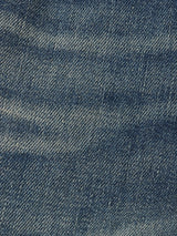 Close-up of Vinci Dark Vintage Jeans by Blue de Gênes in mid blue denim, showing the diagonal weave, faded details, and textured color variations of these regular fit comfort stretch jeans.