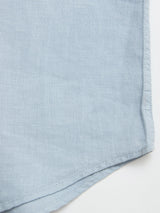 Close-up of the Blue de Gênes BGenric Hope L/S Shirt in Blue Fog, showing the textured linen fabric and visible seam—ideal for a breathable summer look—set against a white background.