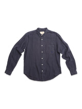 The Blue de Gênes BGenric Hope L/S Shirt in Dark Navy is a breathable linen, long-sleeve button-up with a cut away collar and single chest pocket—perfect for summer days. Laid flat on a white background.