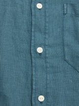 Close-up of the Blue de Gênes BGenric Hope L/S Shirt in Green Harvest: features a textured linen fabric, white buttons, partial chest pocket on the right, and a smart cut away collar—ideal as a breathable summer shirt.