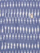 The BGforma Onda S/S Shirt - Blue Pattern by Blue de Gênes features a blue fabric pocket with a white geometric, ikat-style pattern and a small white tag above the pocket with a red and blue shield design.