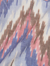 Close-up of the Blue de Gênes BGponti Kala S/S Shirt—crafted from 100% cotton with a multi-pattern abstract zigzag design in blue, pink, brown, and white. The soft fabric features a tribal-inspired look.