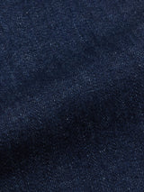 Close-up of Blue de Gênes Vinci Pala Dark V2 Jeans in dark blue denim, highlighting the comfort stretch fabrics textured weave pattern and subtle color variations.