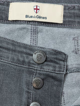 Close-up of Blue de Gênes BGrepi Giulio Light V2 Jeans in grey denim, featuring comfort stretch, a branded label, metal logo buttons, visible stitching, and classic five-pocket styling.