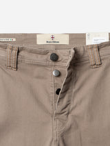 Close-up of the BGpaulo Pavia 1 V2 Chino - Fungi by Blue de Gênes, showing the light brown cotton stretch waistband and fly, visible stitching, two buttons, belt loops, a branded label, Italy flag tag, and care tag.